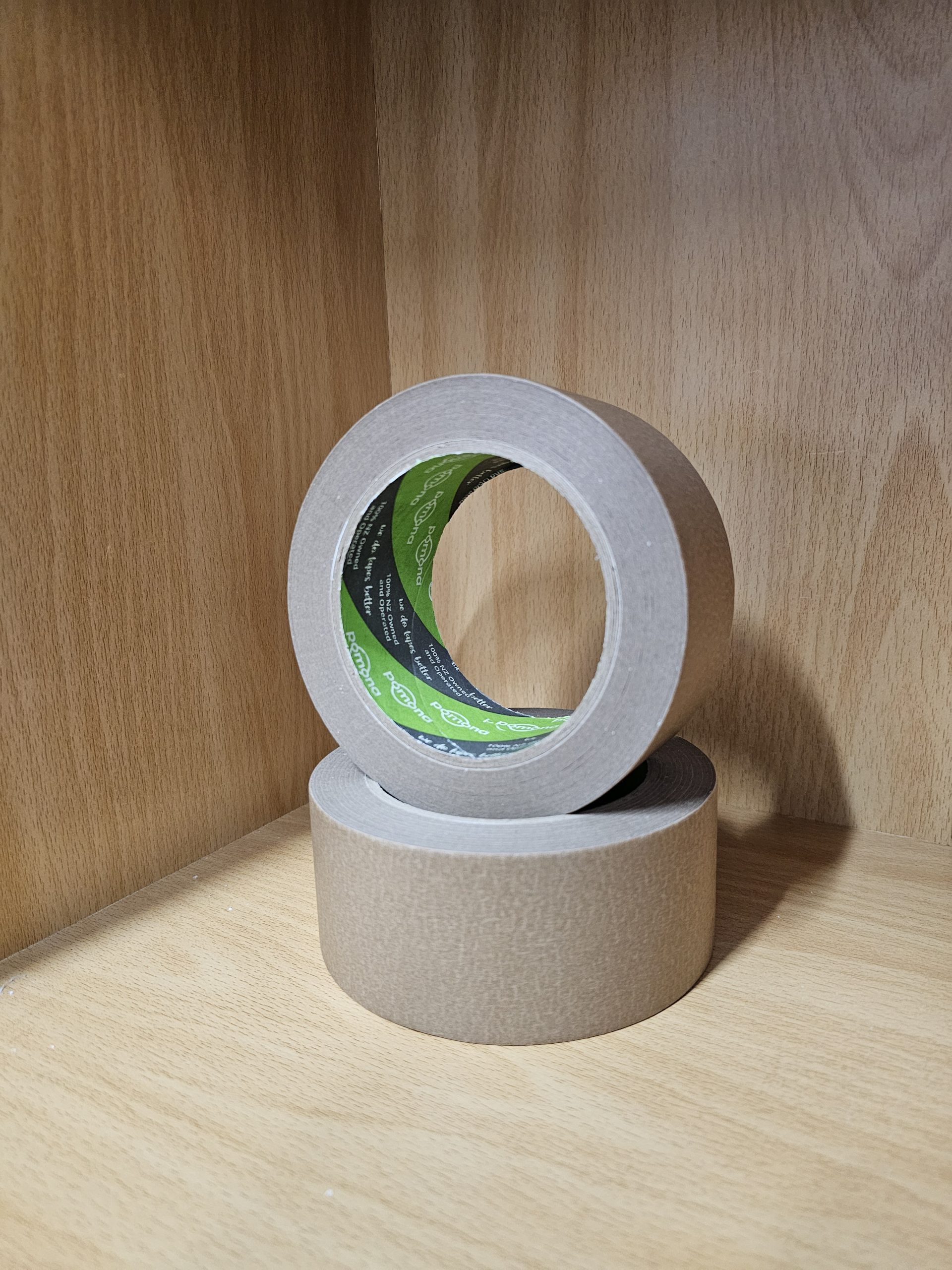 Roll of eco tape made from saturated crepe paper with natural rubber adhesive