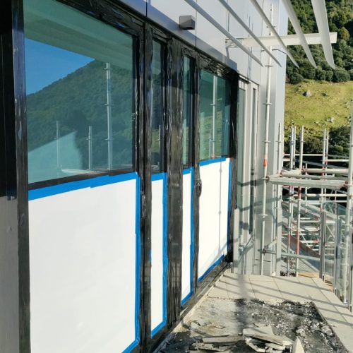 Window Film, Flute Board & Joinery Tape For A Demo At Pacific Apartment Complex